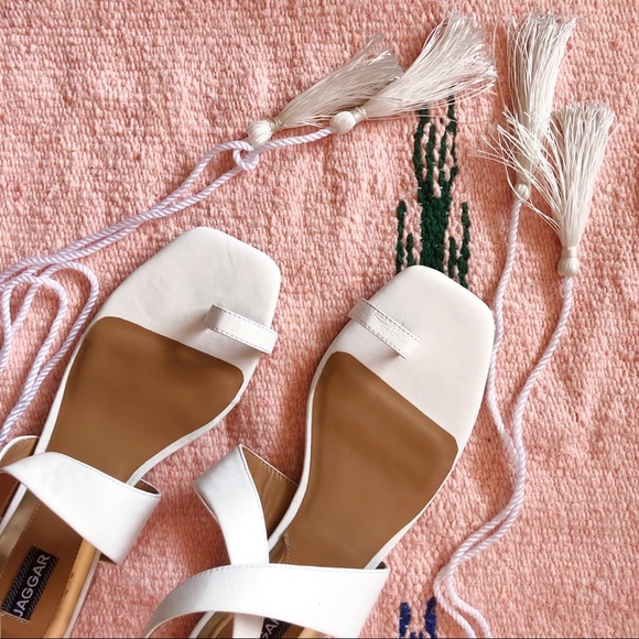 white tassel sandals